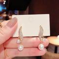 Luminous Double-Pearl Earrings