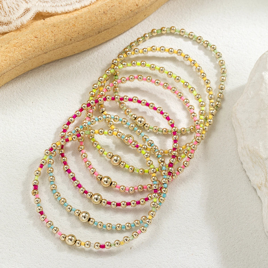 7 Bohemian style colorful rice bead bracelets with multiple layers of stacked beads, women's elastic thread bracelet