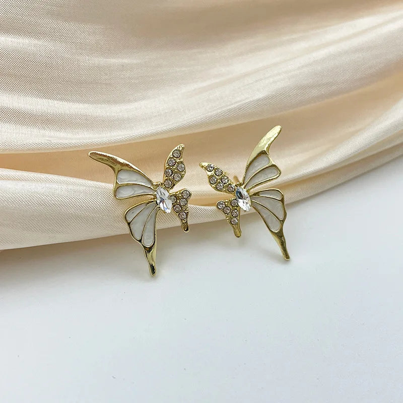 Golden Butterfly Stud Earrings with Pink Enamel Wings