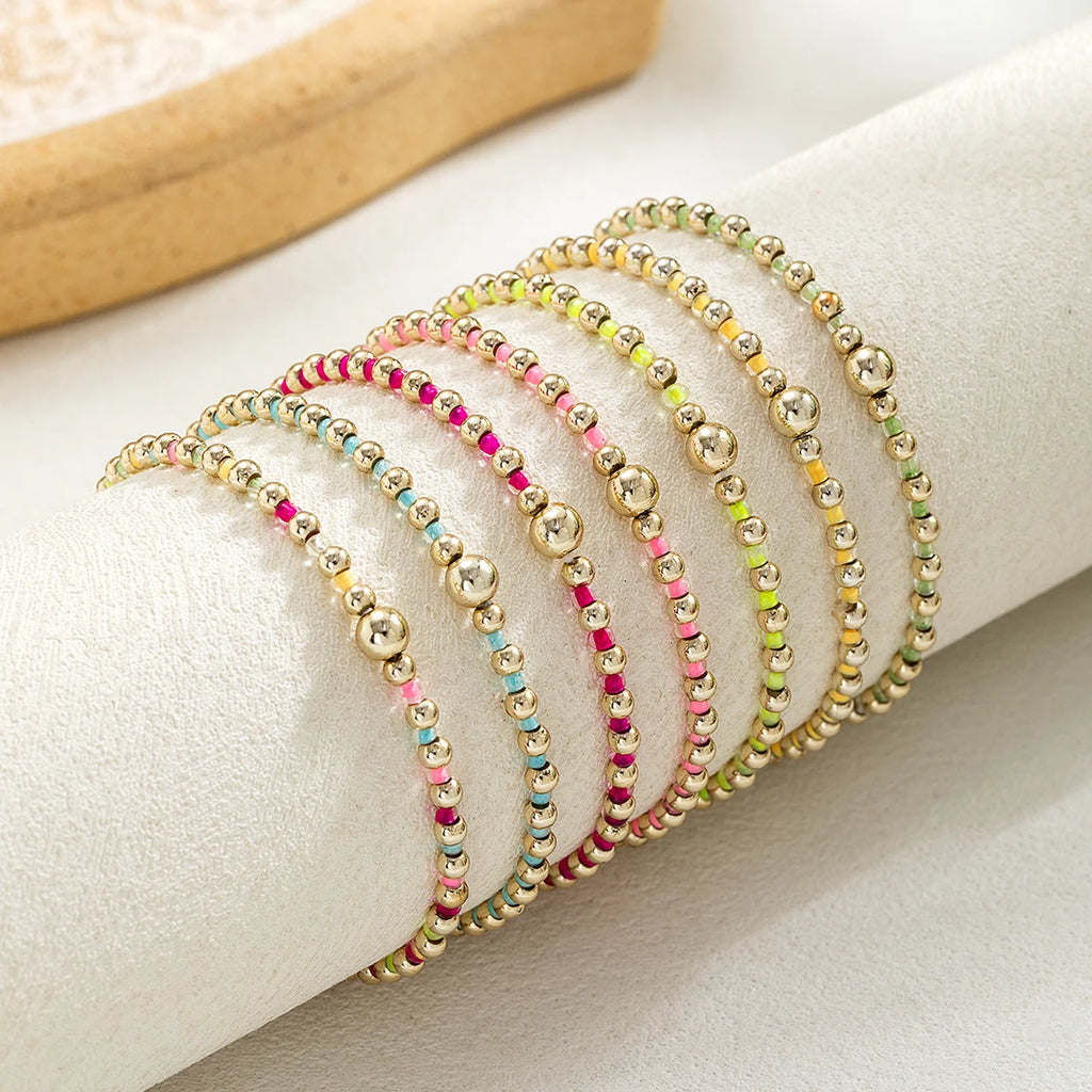 7 Bohemian style colorful rice bead bracelets with multiple layers of stacked beads, women's elastic thread bracelet